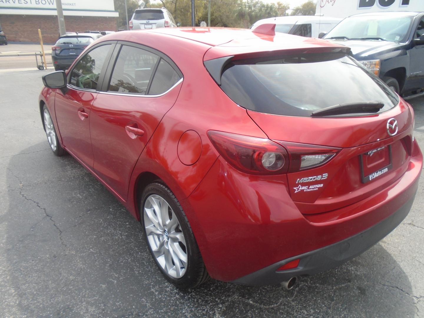 2014 Mazda MAZDA3 (JM1BM1M32E1) , located at 6112 N Florida Avenue, Tampa, FL, 33604, (888) 521-5131, 27.954929, -82.459534 - Photo#4